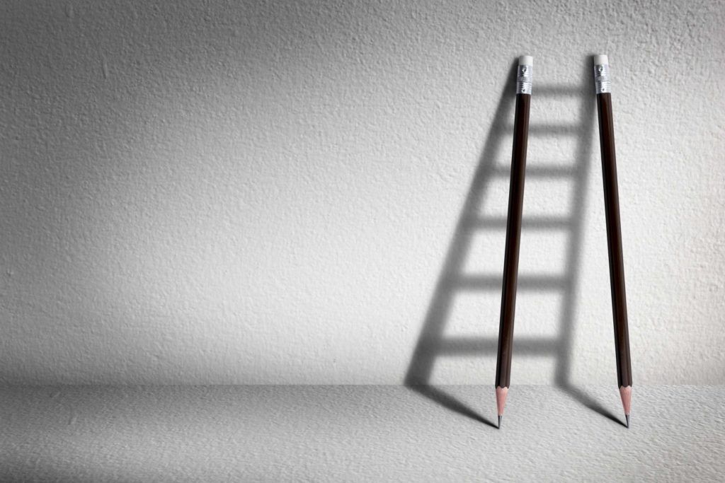 pencils casting a shadow of a ladder to illustrate the concept of early stage financings