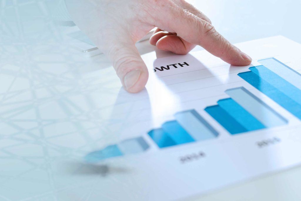 hand pointing at bar graphs that illustrate the concept of document preparation